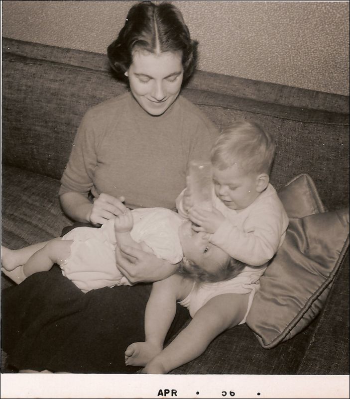 333 Scott feeding Holly April 1956